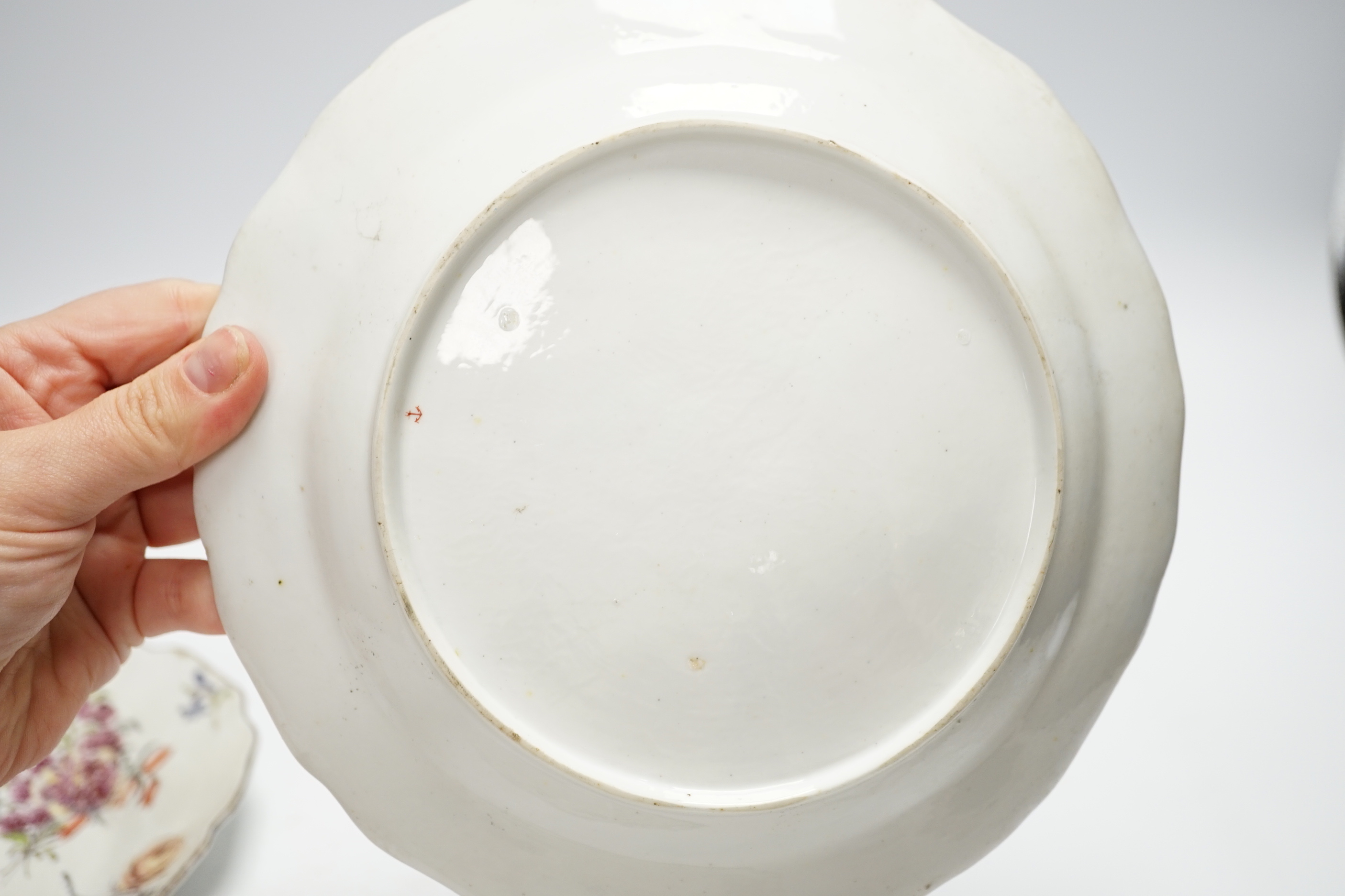 A Chelsea red anchor plate and silver shape dish, c.1756 and a Chelsea gold anchor plate, 1760-5, oval dish 20cm wide